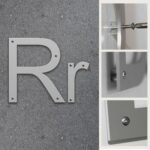 Fasadbokstav R i Aluminium med skruvhål