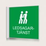 Flaggskylt Ledsagartjänst Grön 150 x 150 mm