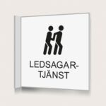 Flaggskylt Ledsagartjänst Vit 150 x 150 mm