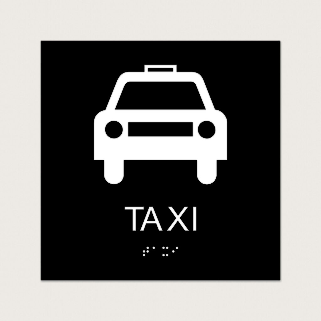 Taktilt Piktogram med text Taxi svart raka hörn