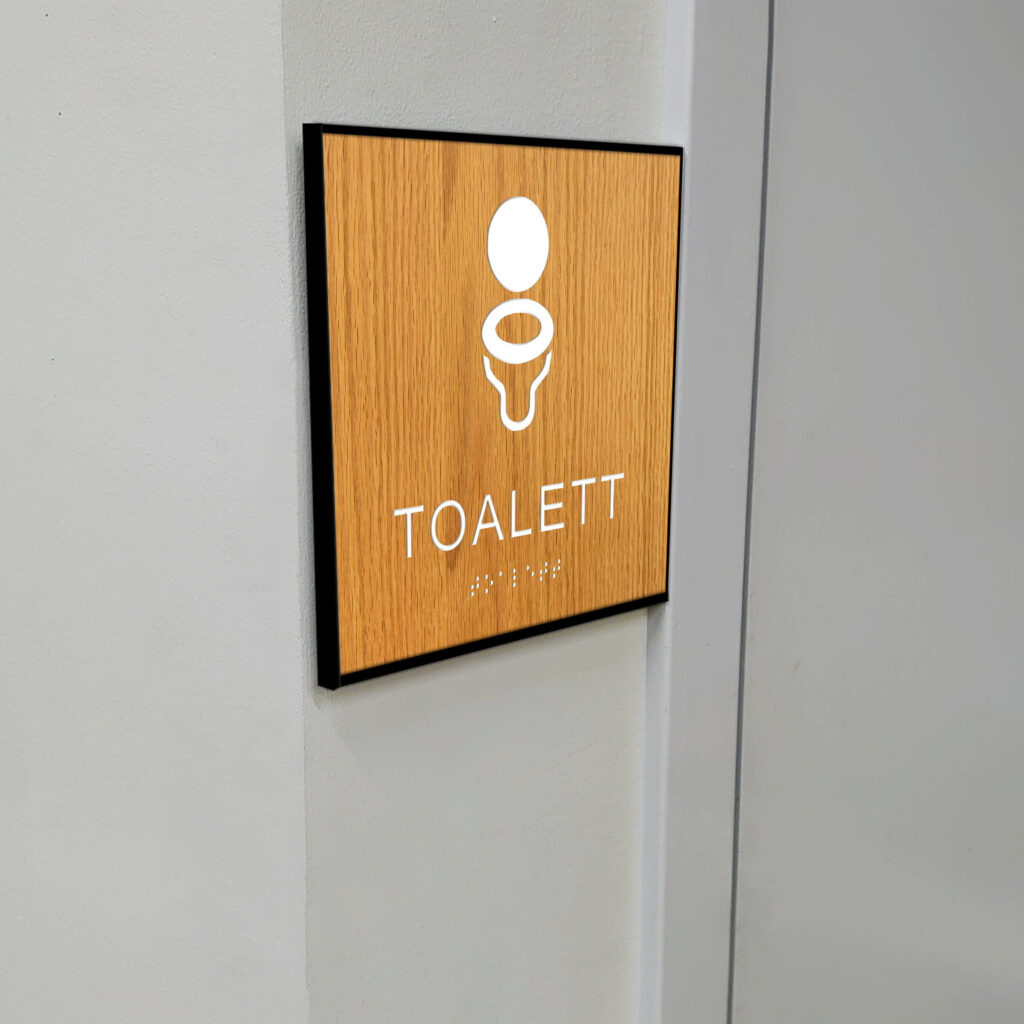 Taktilt piktogram trä med ram Unisex Toalett