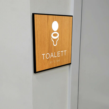 Taktilt piktogram trä med ram Unisex Toalett