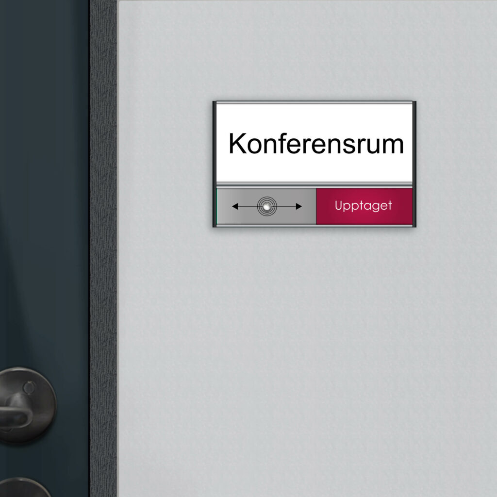 Rumsskylt med Ledigt /Upptaget funktion vid en dörr.