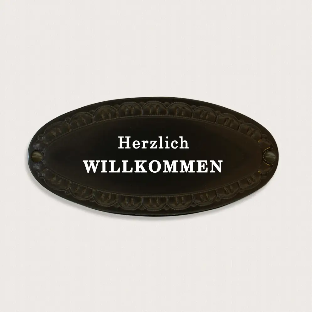 Schild herzlich willkommen